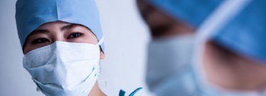 doctor wearing proper medical gear