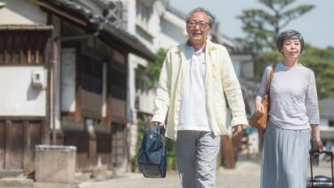 two elder couple walking
